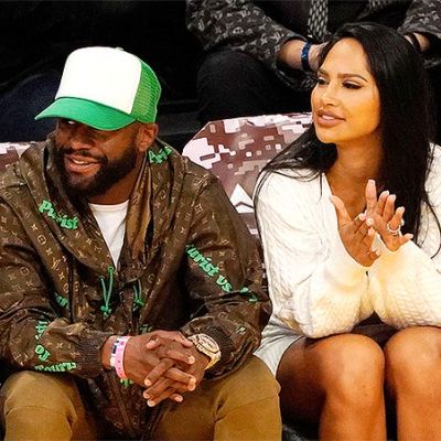 Boxing Legend Floyd Mayweather with his girlfriend Nabila in an NBA game.